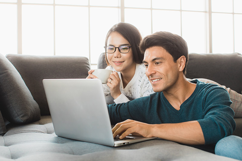 Couple looking at computer